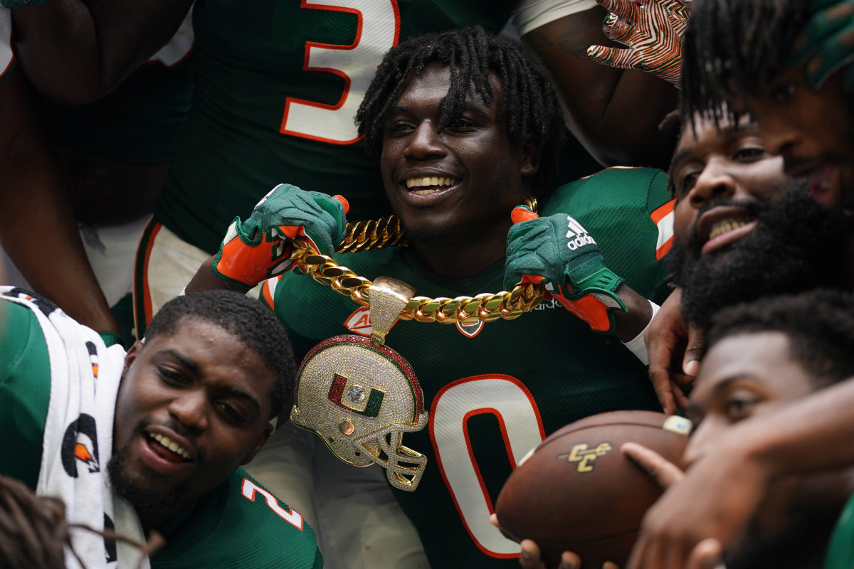 Miami players display their "Turnover Chain" during the 2021 game against Central Connecticut State. (Jason Vinlove/USA Today Sports)